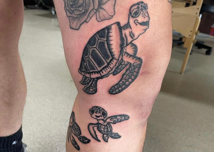 Picture, of a tattoo by Troy, tattoo artist at Top Hat Tattoo, Seattle, black and gray cute tortoise and baby tortoises
