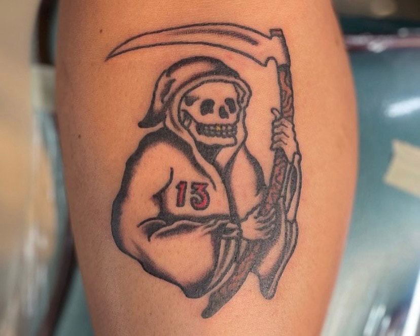 Picture, of a tattoo by Troy, tattoo artist at Top Hat Tattoo, Seattle, grim reaper with a 13