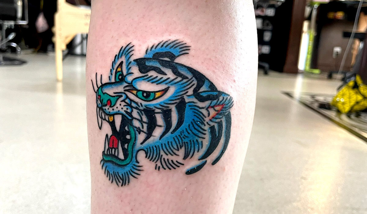 Picture, of a tattoo by Troy, tattoo artist at Top Hat Tattoo, Seattle, Blue tiger