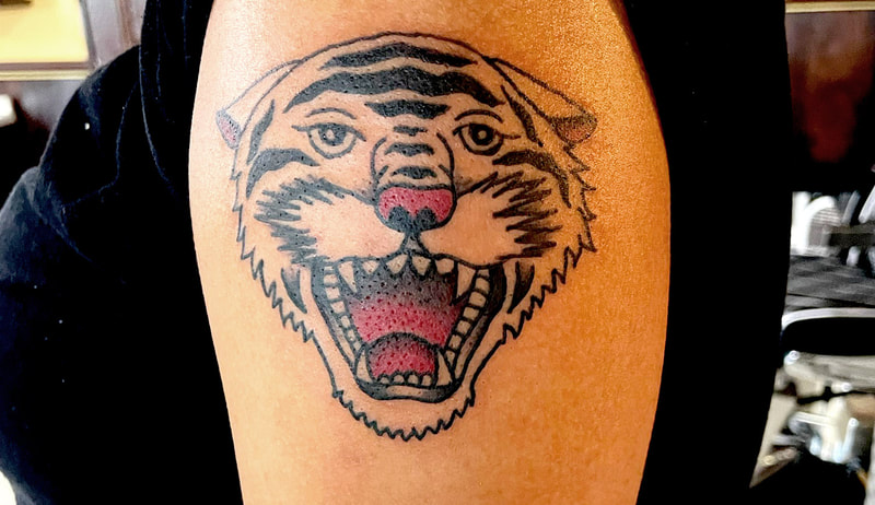 Picture, of a tattoo by Troy, tattoo artist at Top Hat Tattoo, Seattle, tiger