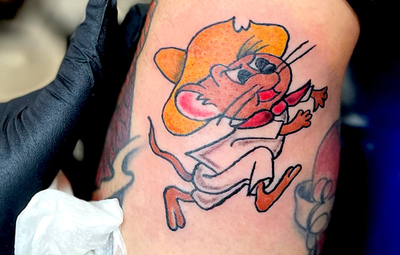 Picture, of a tattoo by Troy, tattoo artist at Top Hat Tattoo, Seattle, speedy gonzales loony toons character running