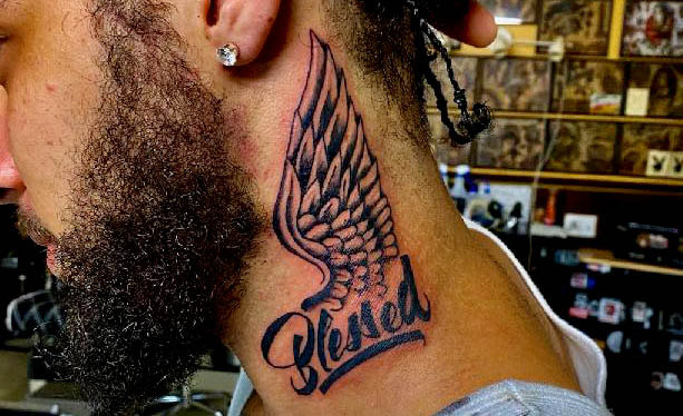 Picture of a tattoo, "Blessed" with a wing on a neck. Max, Mad Max, Mad Max Wallace, Tattoo, Flash, Painting, Top Hat, Artist, Art, Wing, Neck, Blessed, Black & Gray