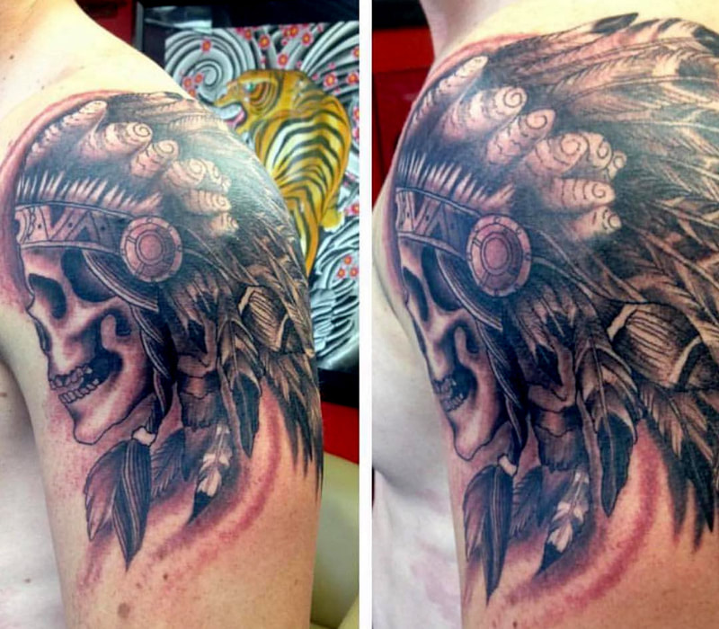 Native American Skull with Headdress by Agus Top Hat Tattoo