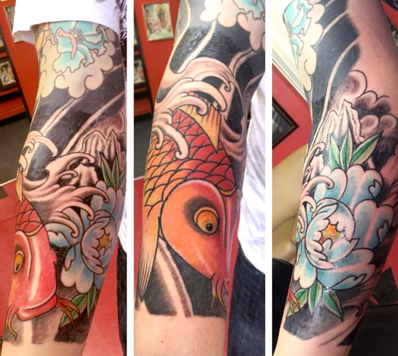 Japanese style Koi Fish tattoo with flower and water by Agus at Top Hat Tattoo